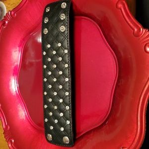 Beautifully rhinestones accented black quilted cuff bracelet.